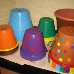 Geschneckte malen Blumentöpfe